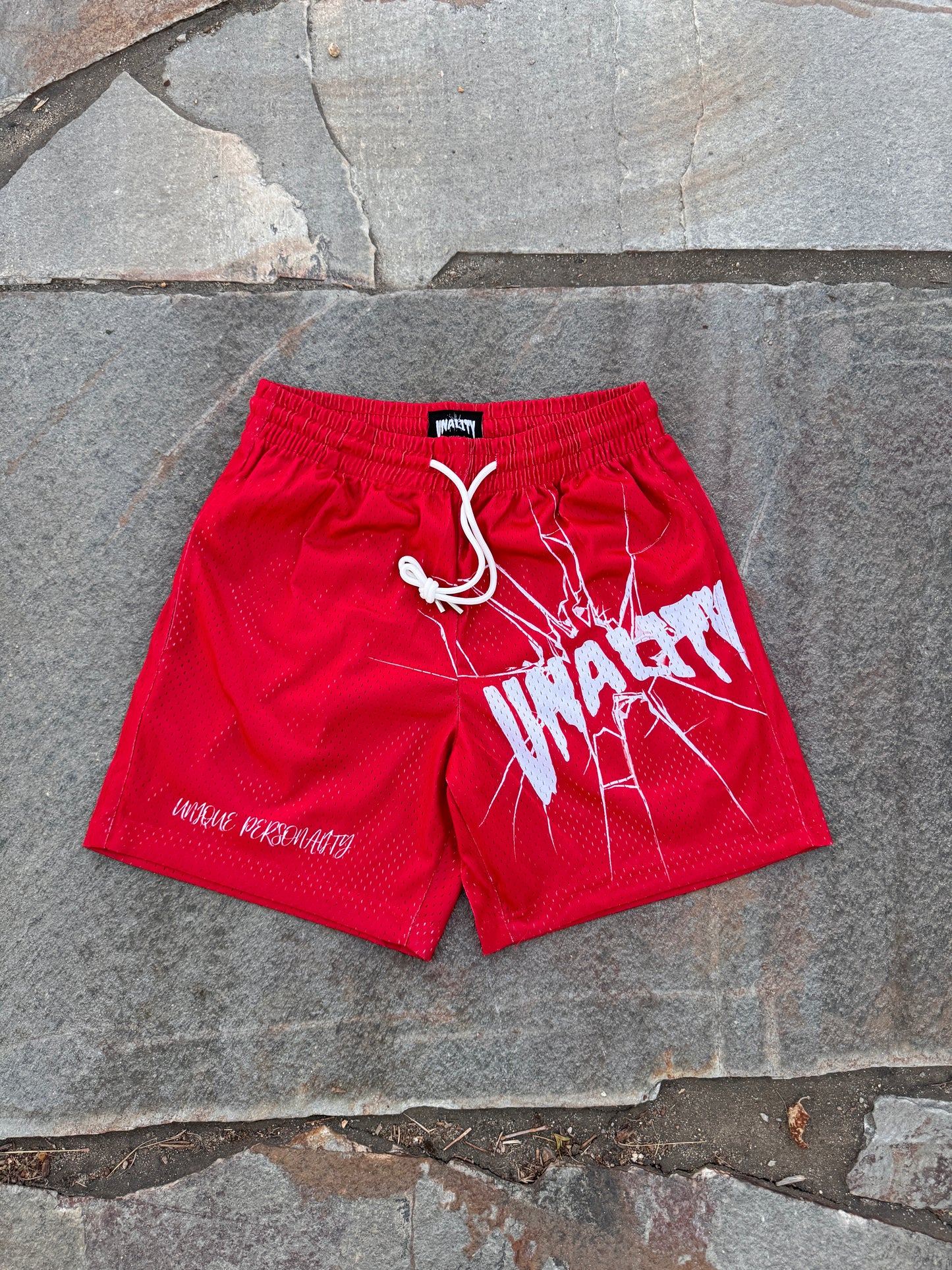 Red mesh Unality shorts